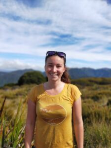A portrait of Tessa in the mountains.